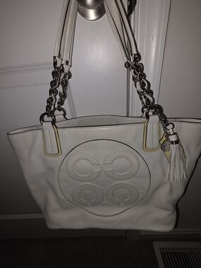 Textured White Tote with Chain-Detail Straps and Tassel Charm